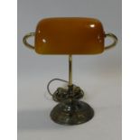 A Christopher Wray vintage style embossed brass desk lamp with amber glass shade. H.38cm