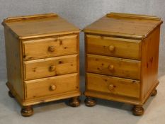 A pair of Victorian style pine three drawer bedside chests. H.62 W.46 D.45cm