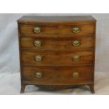 A Regency mahogany bowfronted chest of four long graduating drawers fitted with brass plate