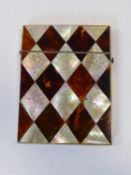 A 19th century mother-of-pearl, and tortoiseshell card case with diamond checkerboard design, the