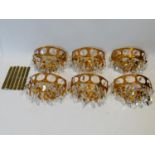 A set of six gilt metal wall lights with crystal drops. H.20cm