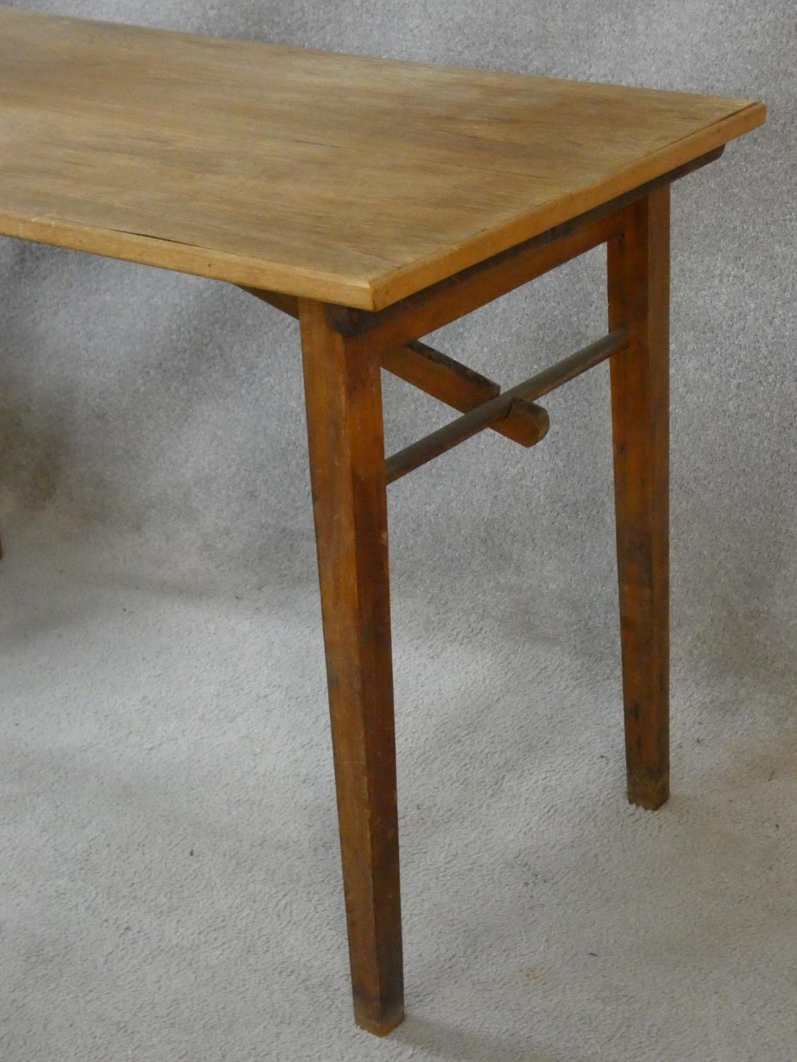 A mid century folding table, makers plaque to the underside. H.70 L.109 W.58cm - Image 3 of 5