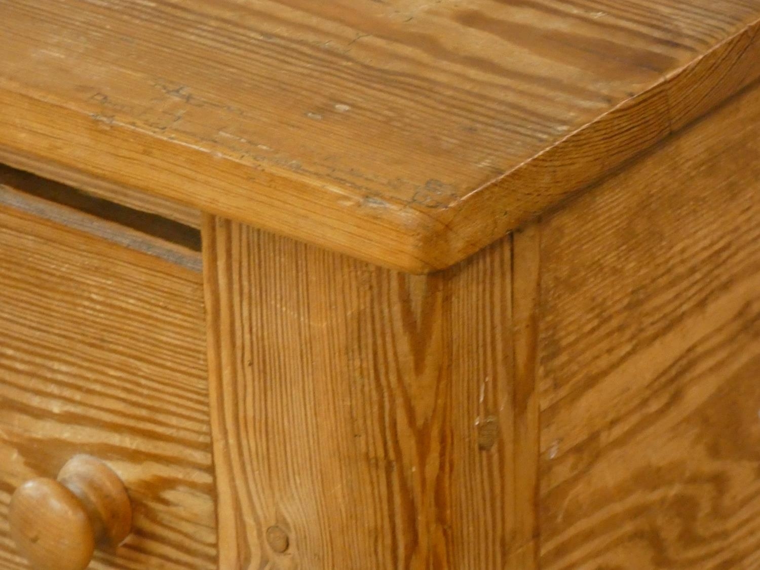 A 19th century pitch pine kneehole writing table with three frieze drawers on turned tapering - Image 4 of 5