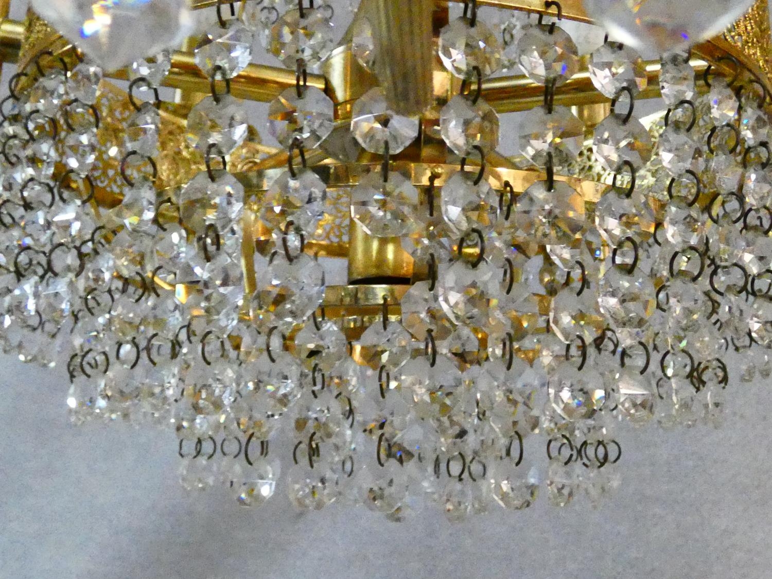 A pair of gilt metal five branch chandeliers with crystal drops. H.80 D.44cm - Image 6 of 10