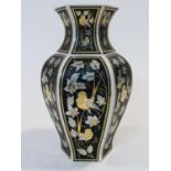 A Vintage Decor Exclusiv Italian black Chinese style vase decorated with flowers and birds with