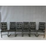 A set of six buttoned faux leather dining chairs on chrome cantilever bases. H.94cm