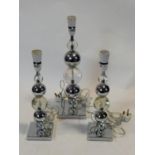 A set of three chrome and bubble glass table lamp bases. H.50cm