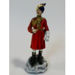 A Michael Sutty hand painted porcelain figure, The Governor's Bodyguard Madras. H.30cm