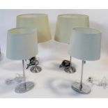 A pair of contemporary table lamps and their shades and a similar pair. H.59cm