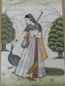 A 20th century framed and glazed Indo-Persian silk painting of Princess Maru with a peacock. With