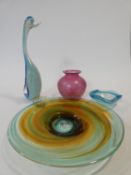 A collection of Art glass. Including an iridescent lustre cranberry glass vase,a green and orange