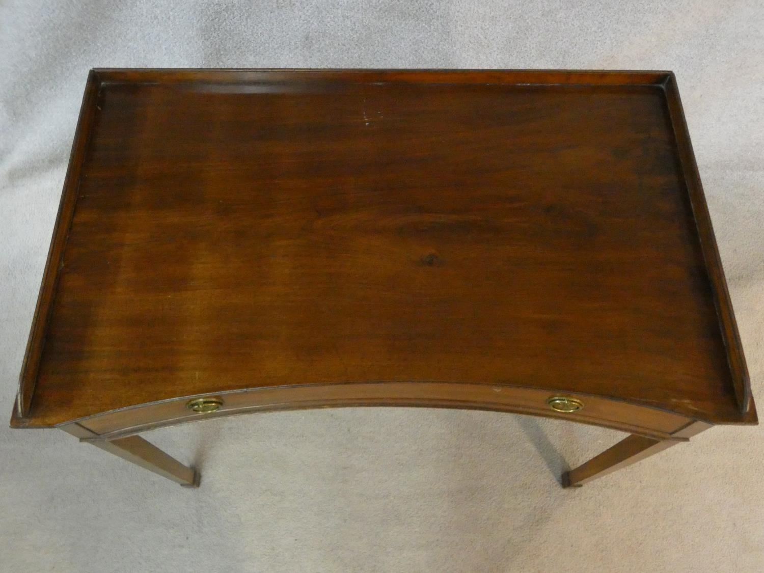 A 19th century mahogany writing table of concave outline fitted with frieze drawer on square - Image 3 of 4