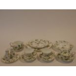 A Wedgwood Wild Strawberry pattern part tea service. Including three cups and saucers, salt and