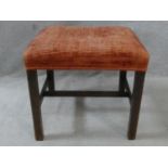 A 19th century mahogany framed stool with stuffover seat on square stretchered supports. H.47 L.52