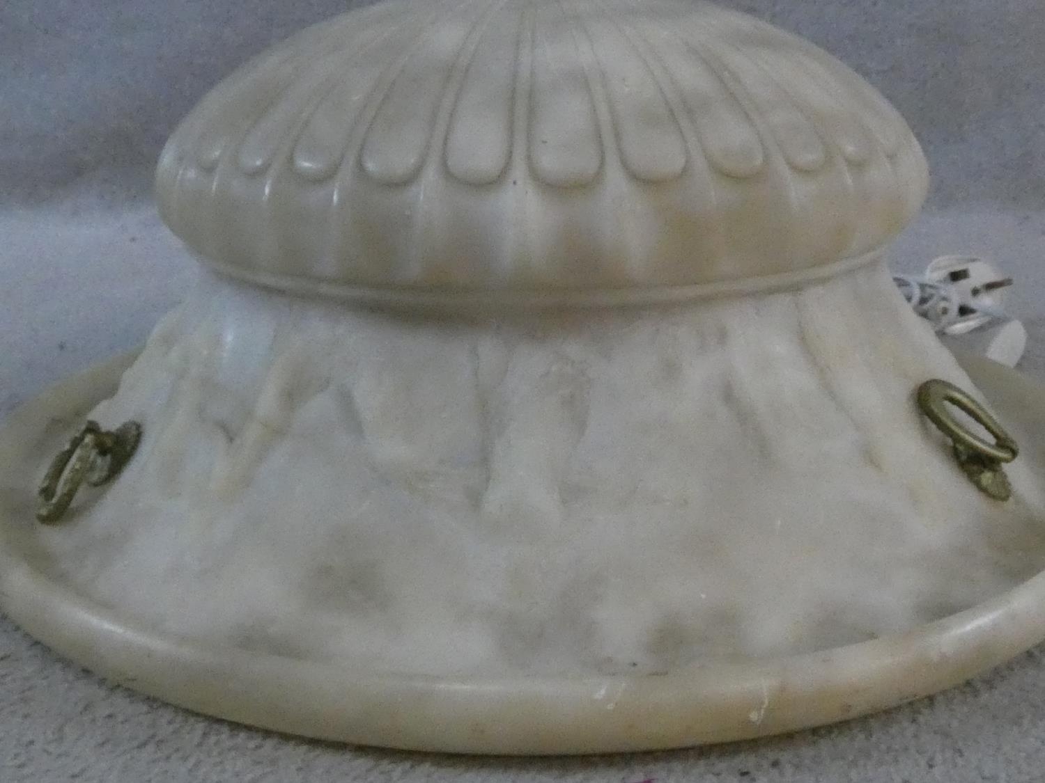 A carved alabaster ceiling light pendant shade of waisted ribbed form. H.19 D.46cm - Image 4 of 6