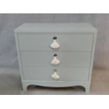 Nina Campbell, a contemporary Regency style straight front chest of three drawers on bracket feet