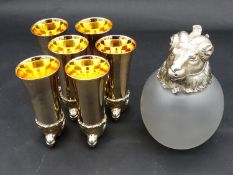 A set of six vintage silver plated ram's head hunting cups and matching frosted glass claret jug.