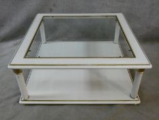 A contemporary white lacquered two tier coffee table with inset plate glass top. H.42 L.100 W.100cm