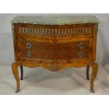 A Louis XV style kingwood and inlaid serpentine fronted marble topped commode with ormolu mounts
