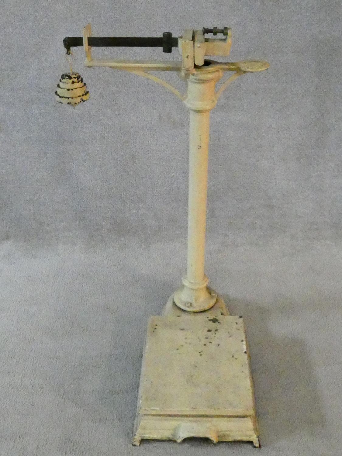 A set of painted cream vintage sack platform scales. H.91 W.58 D.50cm