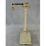 A set of painted cream vintage sack platform scales. H.91 W.58 D.50cm