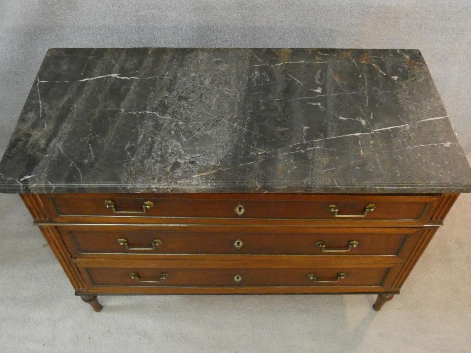 A late 19th century French walnut marble topped commode with three long drawers, brass handles and - Image 3 of 5