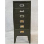 A vintage metal A4 filing cabinet along with an extensive collection of scientific and
