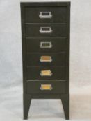 A vintage metal A4 filing cabinet along with an extensive collection of scientific and