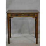 A Georgian mahogany lamp table fitted with frieze drawer on square chamfered supports. H.71 W.71 D.