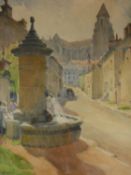 A framed and glazed watercolour, washing clothes in the fountain of rural French town, signed D.