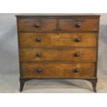 A late Georgian mahogany chest of two short over three long drawers on swept bracket feet. H107.