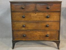 A late Georgian mahogany chest of two short over three long drawers on swept bracket feet. H107.