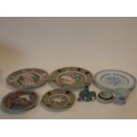 A collection of Oriental porcelain items. Including a celadon glaze ceramic elephant spill vase