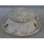 A carved alabaster ceiling light pendant shade of waisted ribbed form. H.19 D.46cm