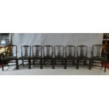 A set of eight late 19th century Georgian style mahogany dining chairs with pierced vase splats