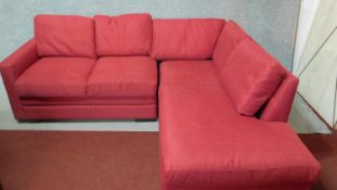A contemporary L-shaped sofa in rose upholstery. H.71 L.190 (long end) L.134 (short end) D.80cm