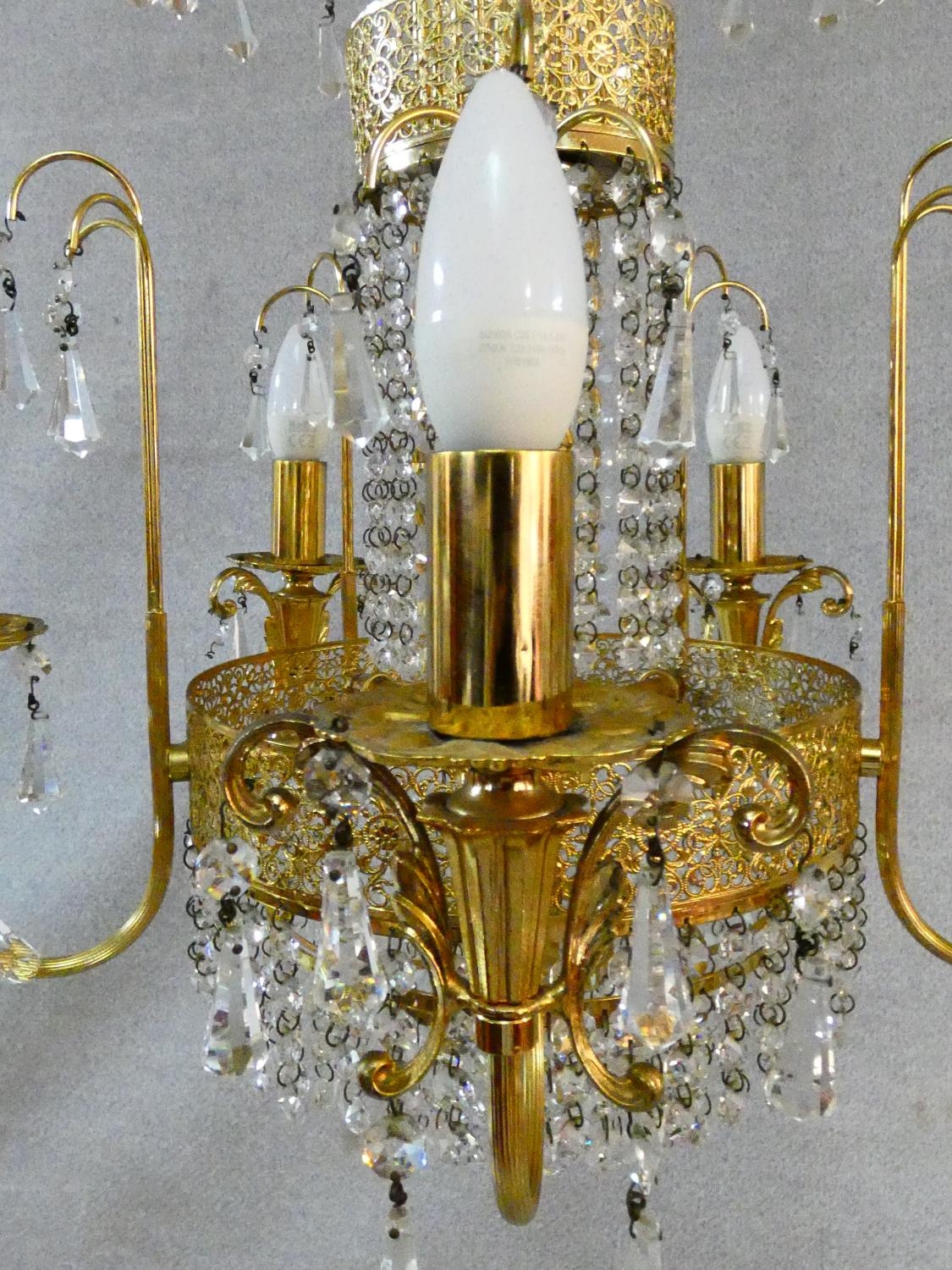 A pair of gilt metal five branch chandeliers with crystal drops. H.80 D.44cm - Image 10 of 10