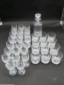 A collection of antique cut crystal. Including twelve petal faceted tumblers, twenty three petal