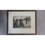 A framed and glazed signed etching by British artist Stanley Anderson RA (1884 - 1966), men at