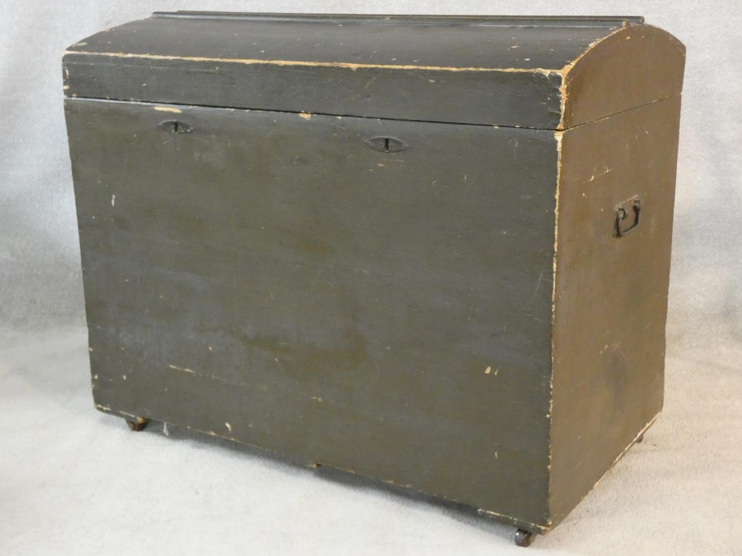 A 19th century domed top travelling trunk on casters. H.88 L.107 W.60cm - Image 2 of 5