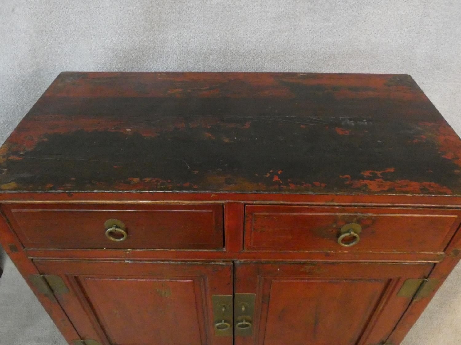 A Chinese hardwood and brass bound side cabinet with frieze drawers above a pair of panel doors on - Image 4 of 6