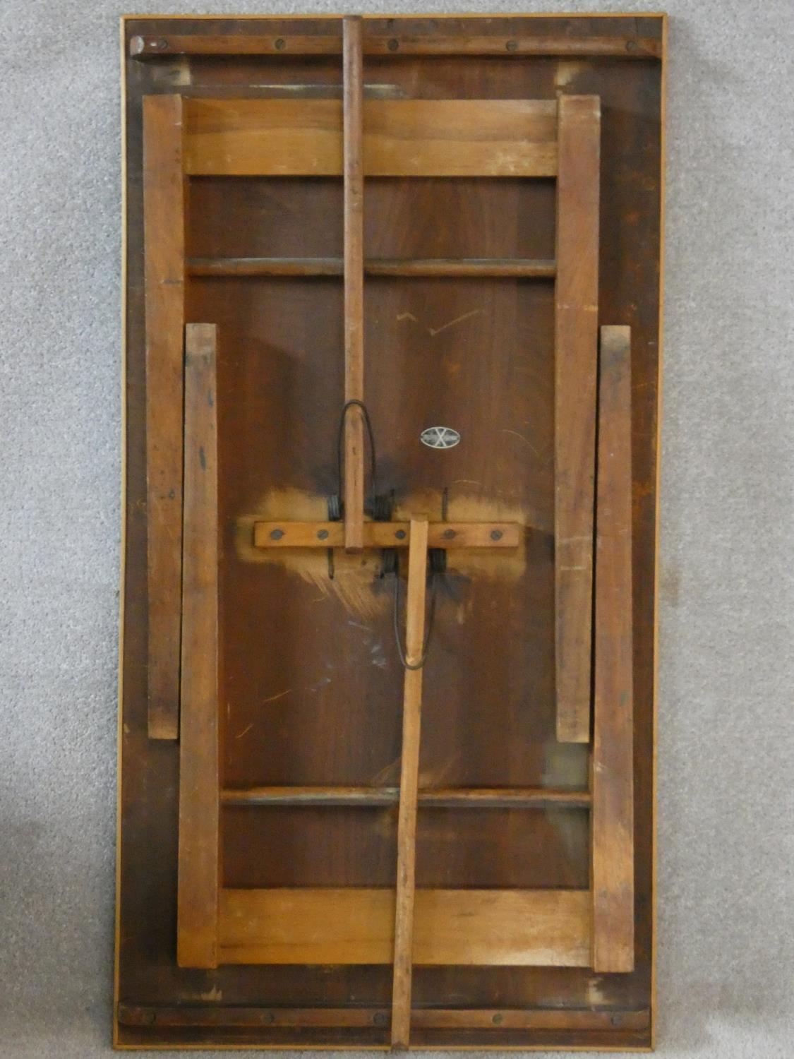 A mid century folding table, makers plaque to the underside. H.70 L.109 W.58cm - Image 4 of 5