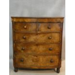 A 19th century mahogany bowfronted chest of drawers with fluted pilasters on turned supports. H.