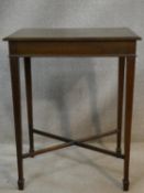 An Edwardian mahogany and satinwood inlaid lamp table on square tapering stretchered supports. H.