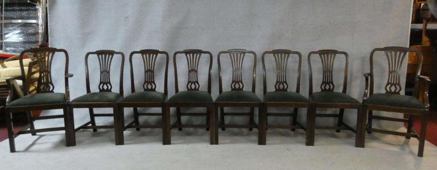 A set of eight late 19th century Georgian style mahogany dining chairs with pierced vase splats