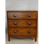 A mid 19th century small mahogany chest of three drawers on shaped bracket feet. H.85 W.79 D.45cm