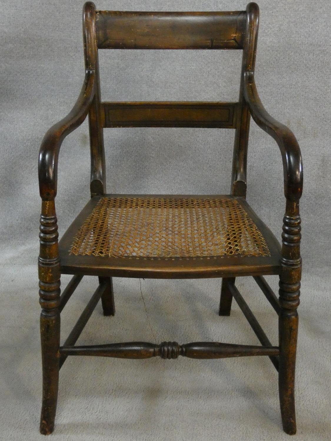 A Regency beech framed and painted caned seated armchair and a similar armchair (damaged as - Image 7 of 10