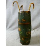 An antique brass bound and coopered stick stand with painted floral decoration along with three