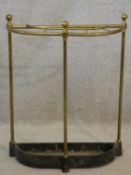 A vintage brass and iron stick and umbrella stand of demi lune outline. H.61 L.48 W.17cm