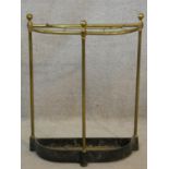 A vintage brass and iron stick and umbrella stand of demi lune outline. H.61 L.48 W.17cm